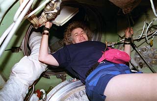 Mir-21 crewmember Shannon Lucid floats in the core node of the Mir Space Station. 